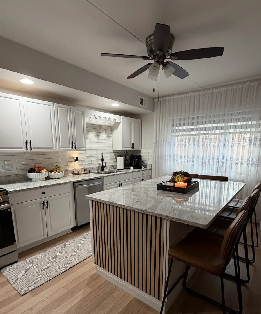 Calacatta-pattern quartz countertop installed in a Chicago suburban kitchen by Granite Solution One